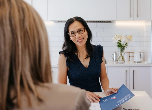 Property Owner having a discussion with Pukeko rental manager